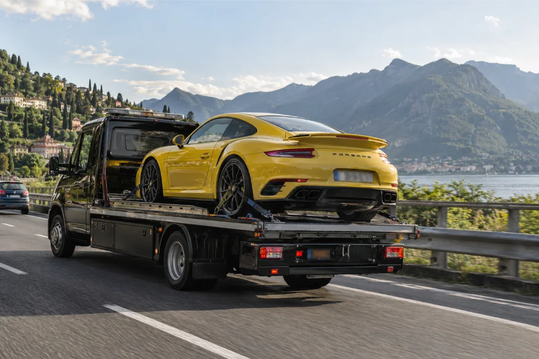 Yellow porsche 911 Turbo Prestige Supercar Recovery Lake Como in Italy